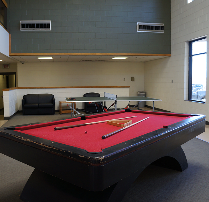 Pool table in Men's Dorm